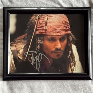 Captain Jack Sparrow Bundle - photo autographed by Johnny Depp, poster, folder